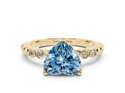 Fancy Blue Heart Cut Diamond Solitaire Engagement Ring Set in Yellow gold with Bezel Accents on Beaded Band