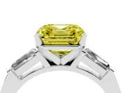 Fancy Yellow Asscher Cut Diamond Solitaire Ring Set in White gold with Tapered Baguette Side Stones and Prong Setting