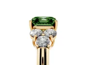 Fancy Green Asscher Cut Diamond Cluster Ring Set in Yellow gold with Round Accent Stones and Prong Setting on a Plain Band