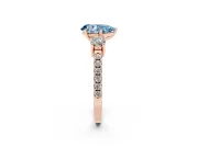 Fancy Blue Three-Stone Pear Cut Diamond Pavé Band Ring Set in Rose gold with Prong Setting