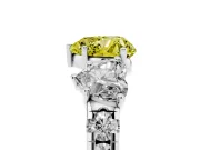 Fancy Yellow Heart Cut Diamond Three-Stone Ring Set in White gold with Pavé Band