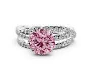 Fancy Pink Round Cut Diamond Solitaire Twist Band Ring Set in White gold with Pavé Setting and Prong Head