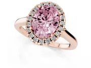 Fancy Pink Oval Cut Halo Round Diamond Solitaire Ring Set in Rose gold with Pavé Band and Prong Setting