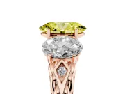 Fancy Yellow Oval Cut Diamond Three-Stone Ring Set in Rose gold with Braided Band