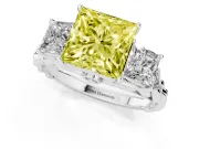 Fancy Yellow Princess Cut Diamond Three-Stone Ring Set in Silver with Braided Band