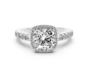 Cushion Cut Diamond Halo Engagement Ring Set in White gold with Pavé Band and Prong Setting