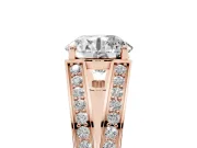 Round Cut Diamond Split Shank Ring Set in Rose gold with Pavé Band and Prong Setting