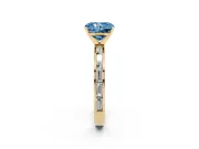 Fancy Blue Radiant Cut Diamond Solitaire Ring Set in Yellow gold with Channel-Set Baguette Band and Prong Setting