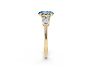 Oval Three-Stone Ring Setting for a Fancy Blue Lab-Grown Diamond | Pear Side Stones | Yellow Gold