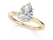 Pear Cut Diamond Solitaire Ring Set in Yellow gold with Thin Band and Prong Setting