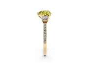Fancy Yellow Heart Cut Diamond Three-Stone Ring Set in Yellow gold with Pavé Band and Graduated Sides