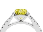 Fancy Yellow Cushion Cut Diamond Halo Engagement Ring Set in White gold with Pavé Band and Prong Setting