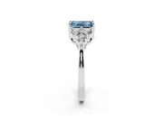 Fancy Blue Emerald Cut Diamond Solitaire Ring Set in Platinum with Cluster Accents on Each Side