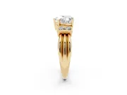 Three-Stone Heart Cut Diamond Channel Set Ring Set in Yellow gold with Bar Prongs