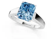 Fancy Blue Radiant Cut Diamond Solitaire Engagement Ring Set in White gold with Prong Setting and Tapered Band