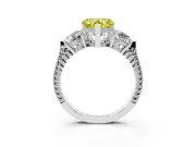 Fancy Yellow Heart Cut Diamond Three-Stone Ring Set in Platinum with Milgrain Band