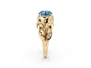 Fancy Blue Round Cut Diamond Leaf-Inspired Engagement Ring Set in Yellow gold with Round Accents