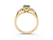 Fancy Green Three-Stone Oval Cut Diamond Ring Set in Yellow gold with Pear Side Stones and Prong Setting