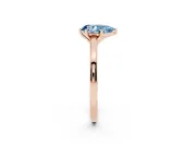 Fancy Blue Pear Cut Diamond Solitaire Engagement Ring Set in Rose gold with Prong Setting on a Classic Band