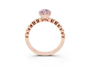Fancy Pink Marquise Cut Diamond Solitaire Engagement Ring Set in Rose gold with Bezel Accents on Beaded Band