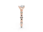 Heart Cut Diamond Solitaire Ring Set in Rose gold with Bezel-Set Accents on Beaded Band and Prong Setting