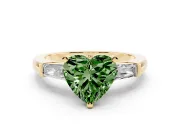 Fancy Green Heart Cut Diamond Solitaire Ring Set in Yellow gold with Tapered Baguette Side Stones and Prong Setting