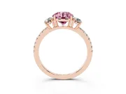 Fancy Pink Round Cut Diamond Three-Stone Ring Set in Rose gold with Pavé Band and Graduated Sides