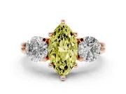 Fancy Yellow Marquise Cut Diamond Three-Stone Ring Set in Rose gold with Prong Setting and Classic Band