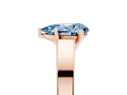 Fancy Blue Pear Cut Diamond Solitaire Engagement Ring Set in Rose gold with Prong Setting and Tapered Band