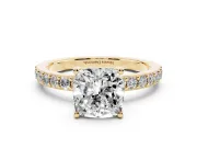 Cushion Cut Diamond Solitaire Set in Yellow gold with Round Pavé Band and Prong Setting