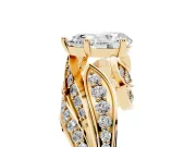 Pear Cut Diamond Solitaire Ring Set in Yellow gold with Layered Twist Pavé Band