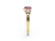 Fancy Pink Heart Cut Diamond Three-Stone Ring Set in Yellow gold with Bold Center and Classic Band