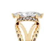 Marquise Cut Diamond Halo Ring Set in Yellow gold with Twisted Band and Prong Setting
