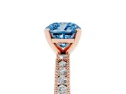 Fancy Blue Cushion Cut Diamond Solitaire Ring Set in Rose gold with Slim Pavé Band and Prong Setting