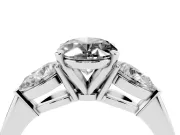 Fancy Black Three-Stone Oval Cut Diamond Ring Set in White gold with Pear Side Stones and Prong Setting