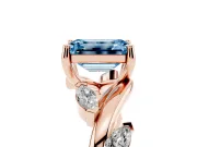 Fancy Blue Emerald Cut Diamond Solitaire Ring Set in Rose gold with Twisted Marquise Accent Band