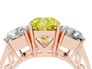 Fancy Yellow Cushion Cut Diamond Three-Stone Ring Set in Rose gold with Textured Band