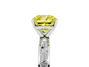 Fancy Yellow Cushion Cut Diamond Solitaire Ring Set in White gold with Channel-Set Baguette Band and Prong Setting