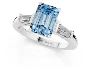 Fancy Blue Emerald Cut Diamond Solitaire Ring Set in Platinum with Tapered Baguette Accents and Prong Setting