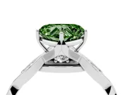 Fancy Green Heart Cut Diamond Twist Band Solitaire Ring Set in Silver with Leaf Prong Setting and Accent Stones
