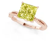 Fancy Yellow Princess Cut Diamond Solitaire Ring Set in Rose gold with Twisted Band and Bead Prong Setting