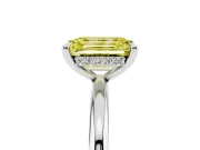 Fancy Yellow Emerald Cut Diamond Solitaire Ring Set in Silver with Thin Band and Prong Setting
