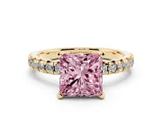 Fancy Pink Princess Cut Diamond Solitaire Pavé Engagement Ring Set in Yellow gold with Round Band and Prong Setting