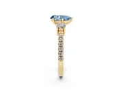 Fancy Blue Three-Stone Pear Cut Diamond Pavé Band Ring Set in Yellow gold with Prong Setting