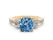 Fancy Blue Three-Stone Cushion Cut Diamond Pavé Band Ring Set in Yellow gold with Prong Setting