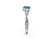 Fancy Blue Heart Cut Diamond Solitaire Engagement Ring Set in Platinum with Twisted Pavé Band and Prong Setting