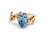 Fancy Blue Pear Cut Diamond Solitaire Twist Engagement Ring Set in Yellow gold with Pavé Leaf Accents