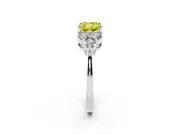 Fancy Yellow Cushion Cut Diamond Solitaire Ring Set in White gold with Cluster Accents on Each Side