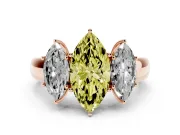 Fancy Yellow Three-Stone Marquise Cut Diamond Ring Set in Rose gold with Matching Prong Settings and Plain Band