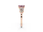 Fancy Pink Emerald Cut Diamond Cluster Engagement Ring Set in Rose gold with Pavé Band and Prong Setting